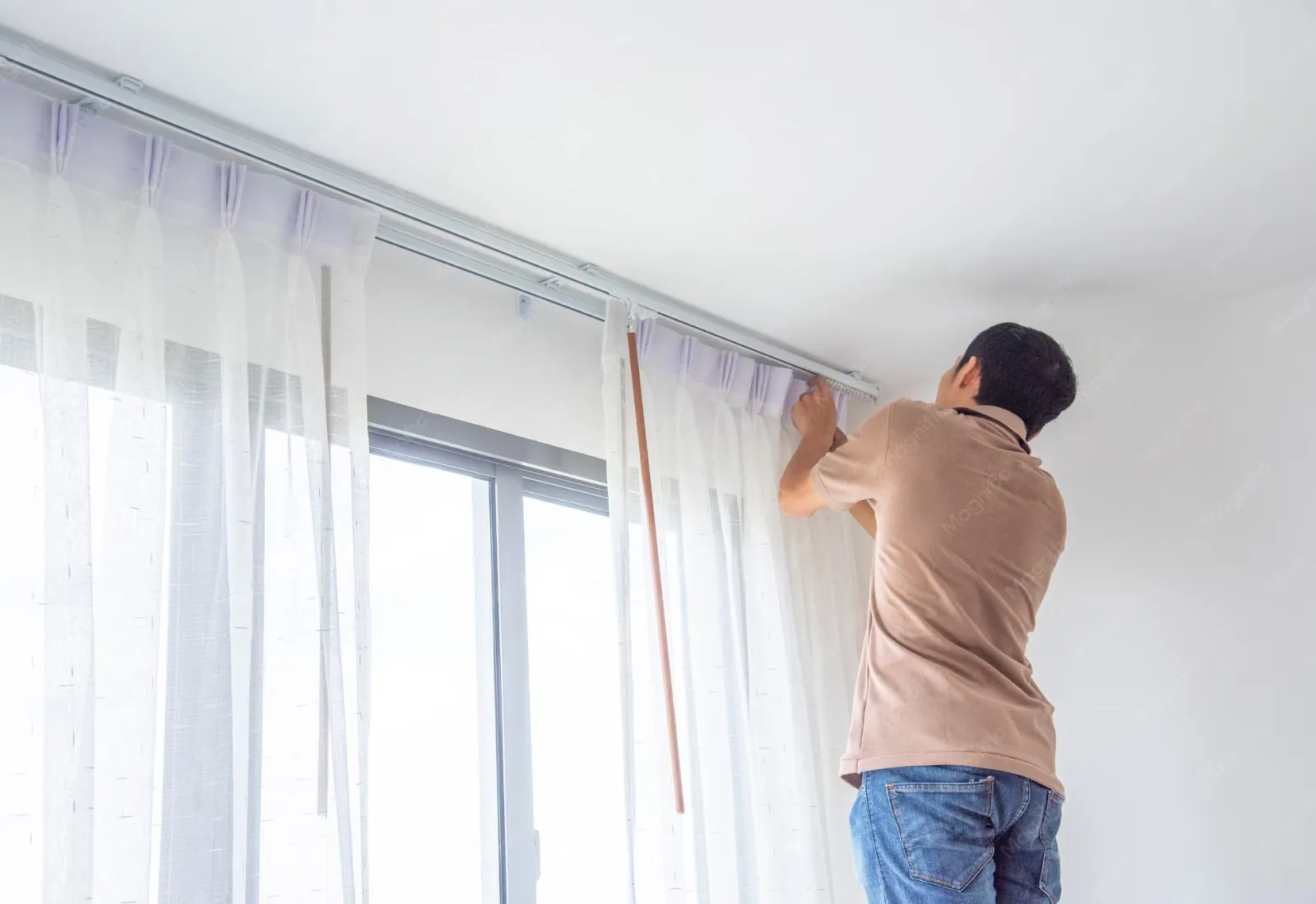 Custom curtain installation fitted to window design