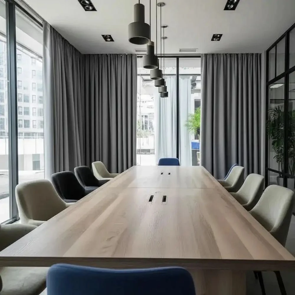 Modern blackout drapes installed in office space