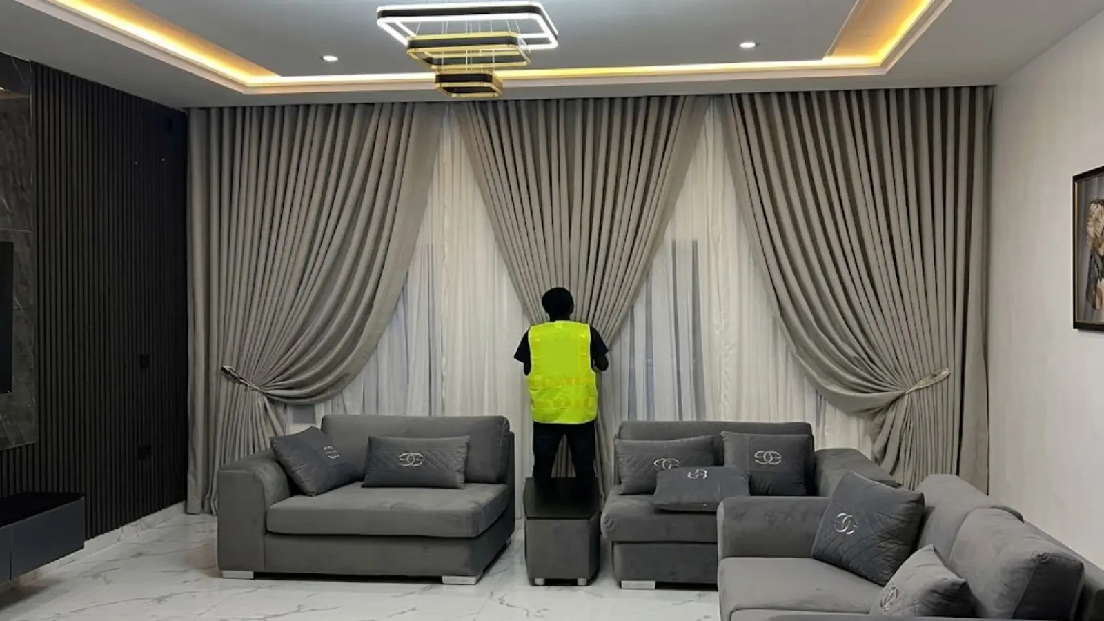 Premium window treatment installation in modern interior