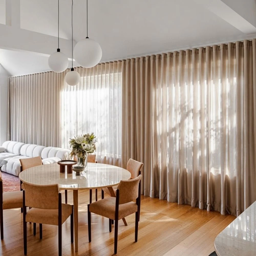 Sleek ripple fold silk curtains installed smoothly