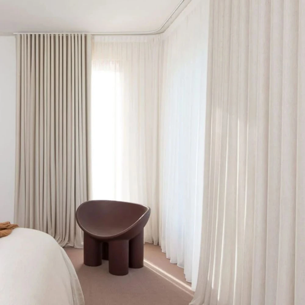 Curtains installed in cozy bedroom Dubai home