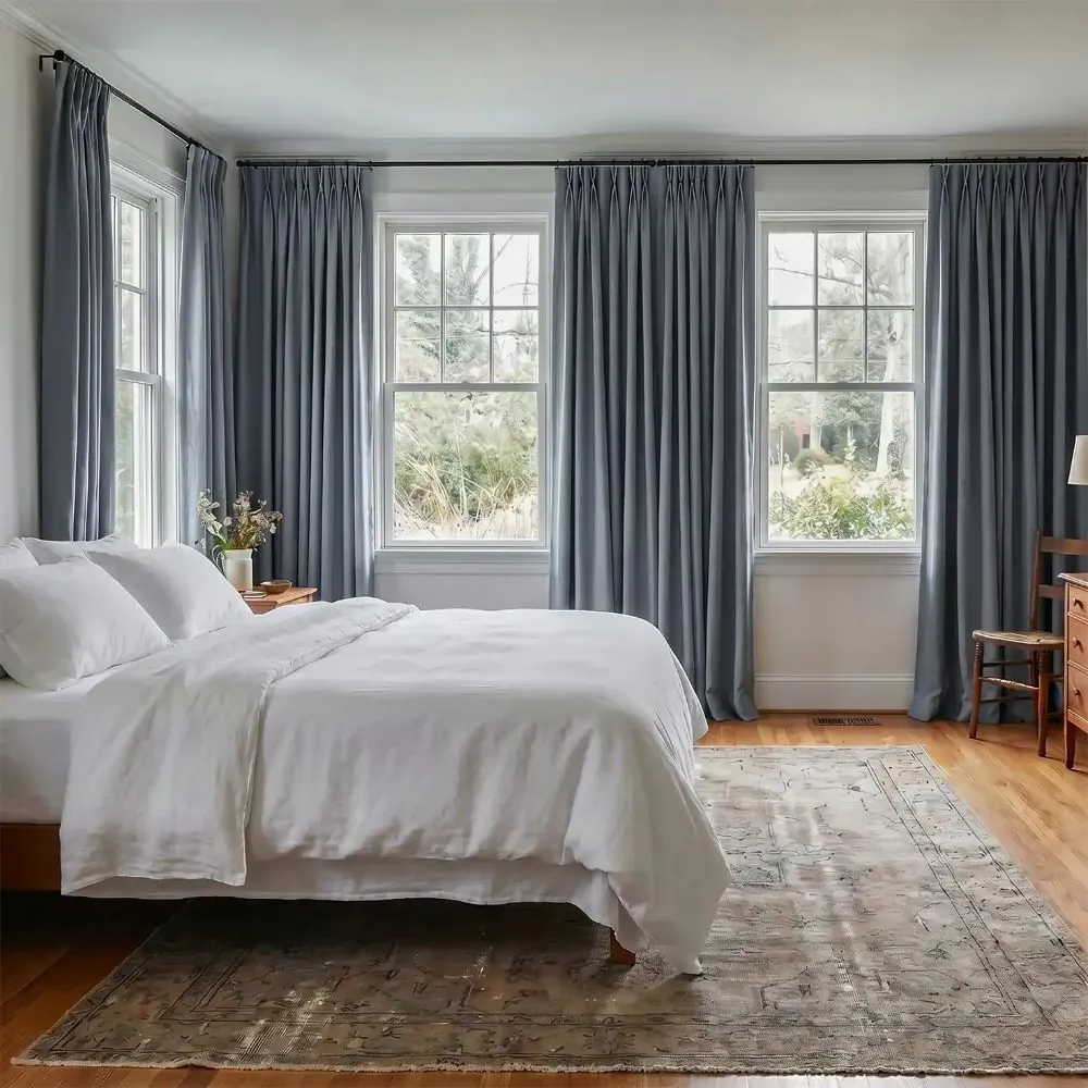 Linen blackout curtains installed for full darkness
