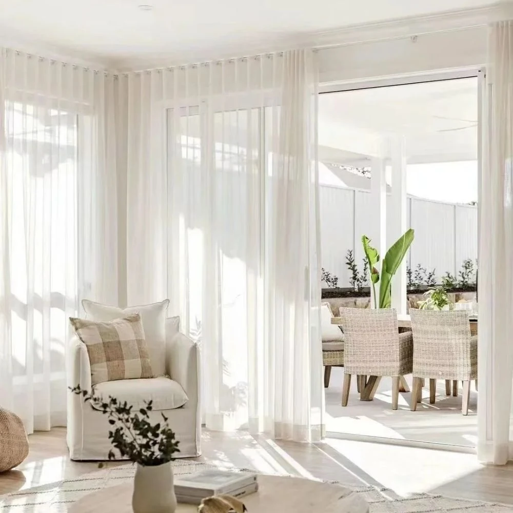 Sheer curtains installed in bright commercial space