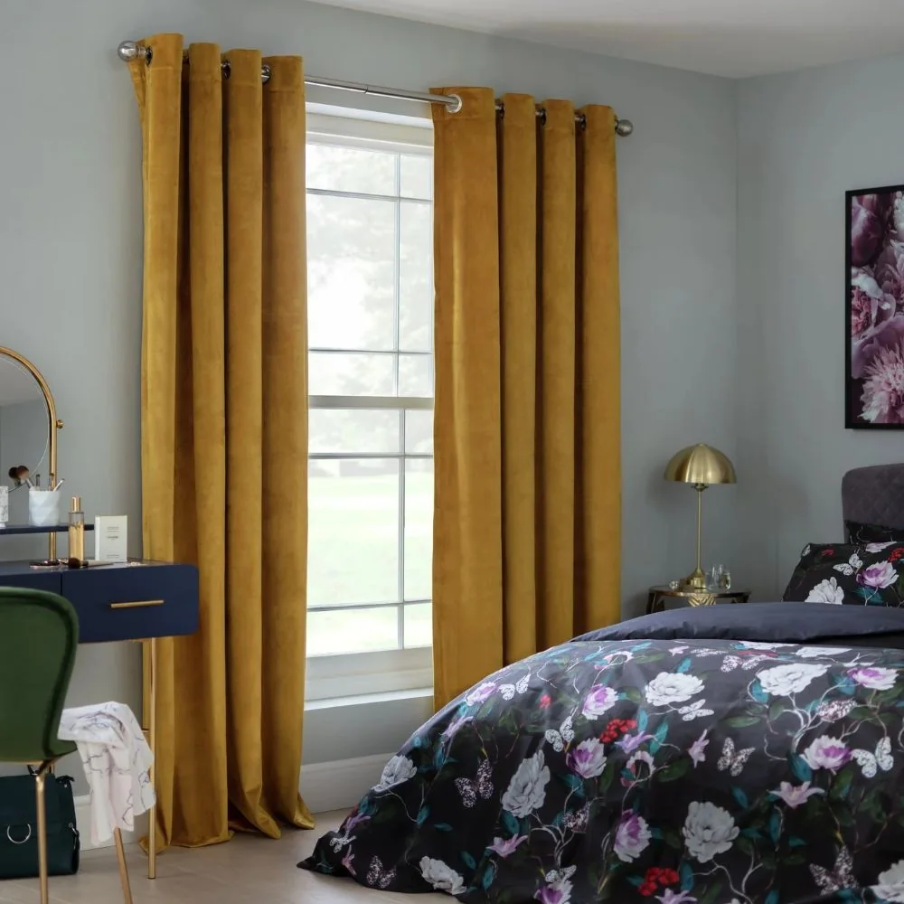 Grommet-style curtain hanging smoothly on metal rod
