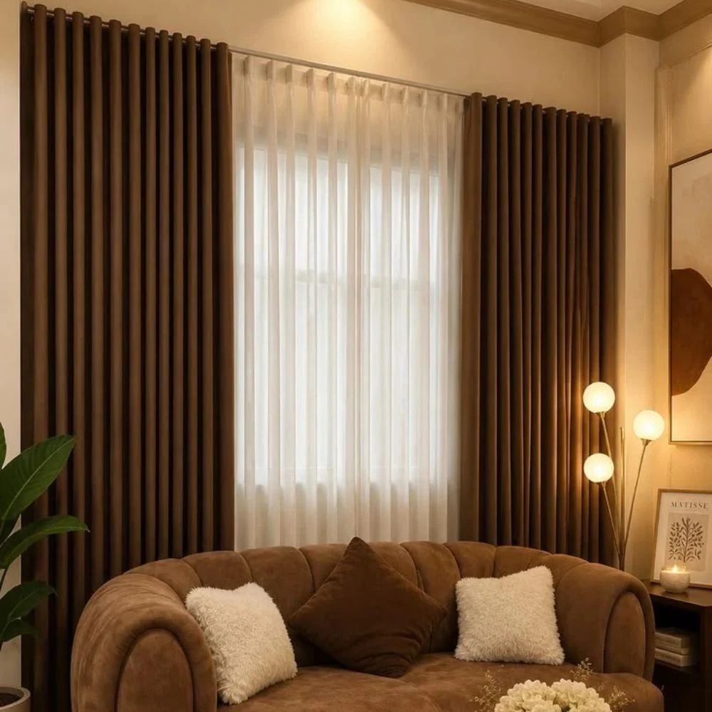 Clean-edged eyelet curtain panel hanging by window