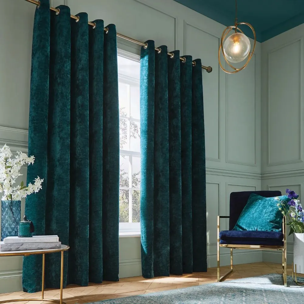 Metal ring curtain hanging neatly on window rod