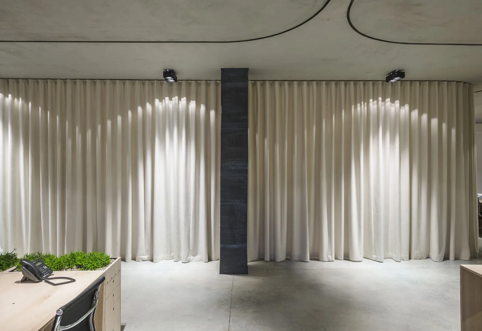 Soundproof wave curtain installed in modern room