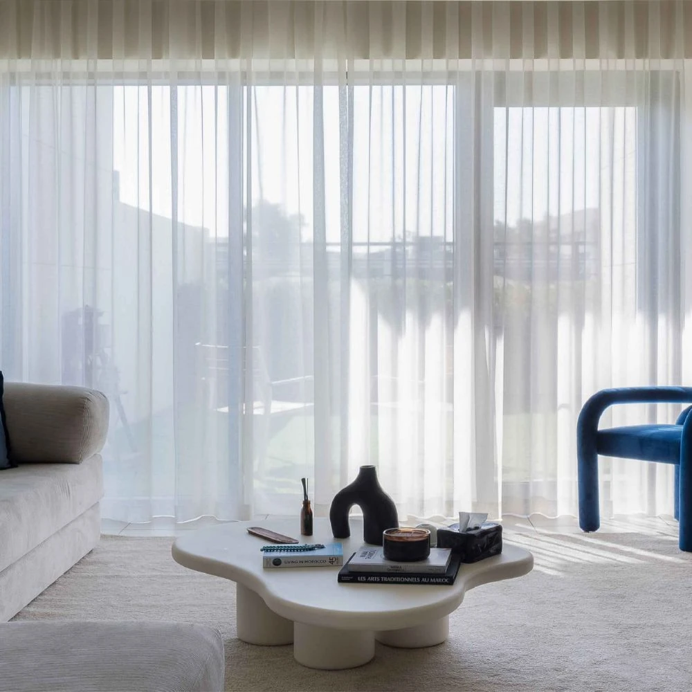 Sheer curtains installed in elegant villa interior
