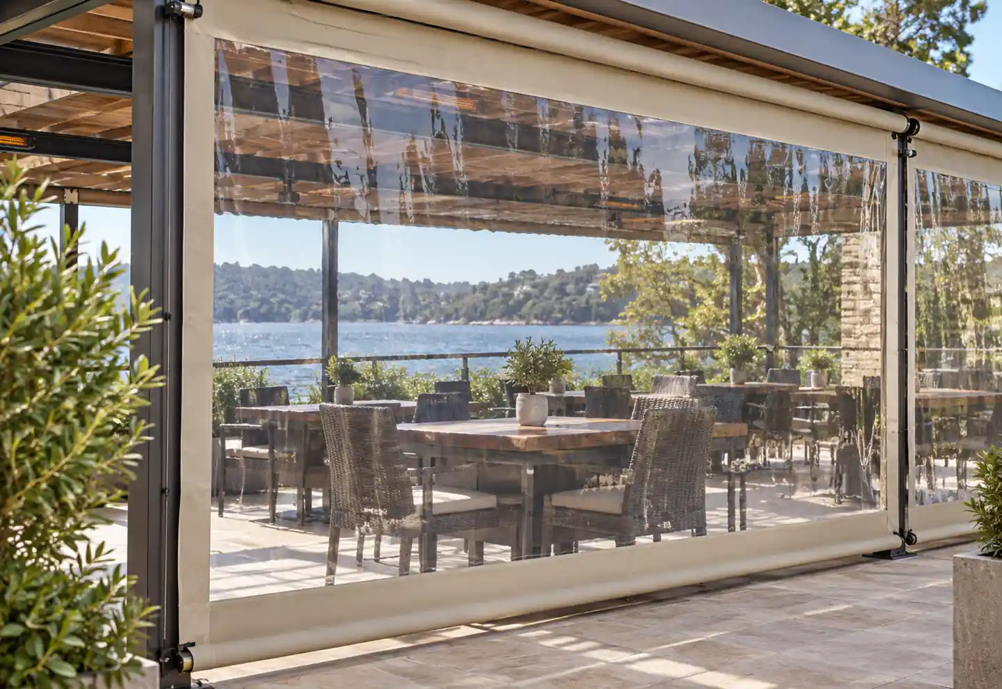 Clear roll-down panels around outdoor dining