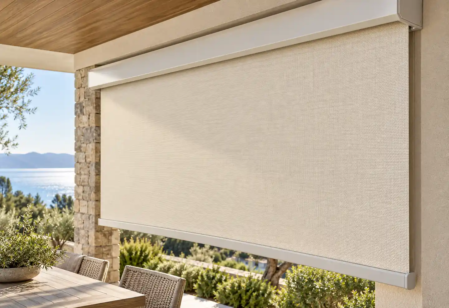 Cream woven shade on a covered terrace